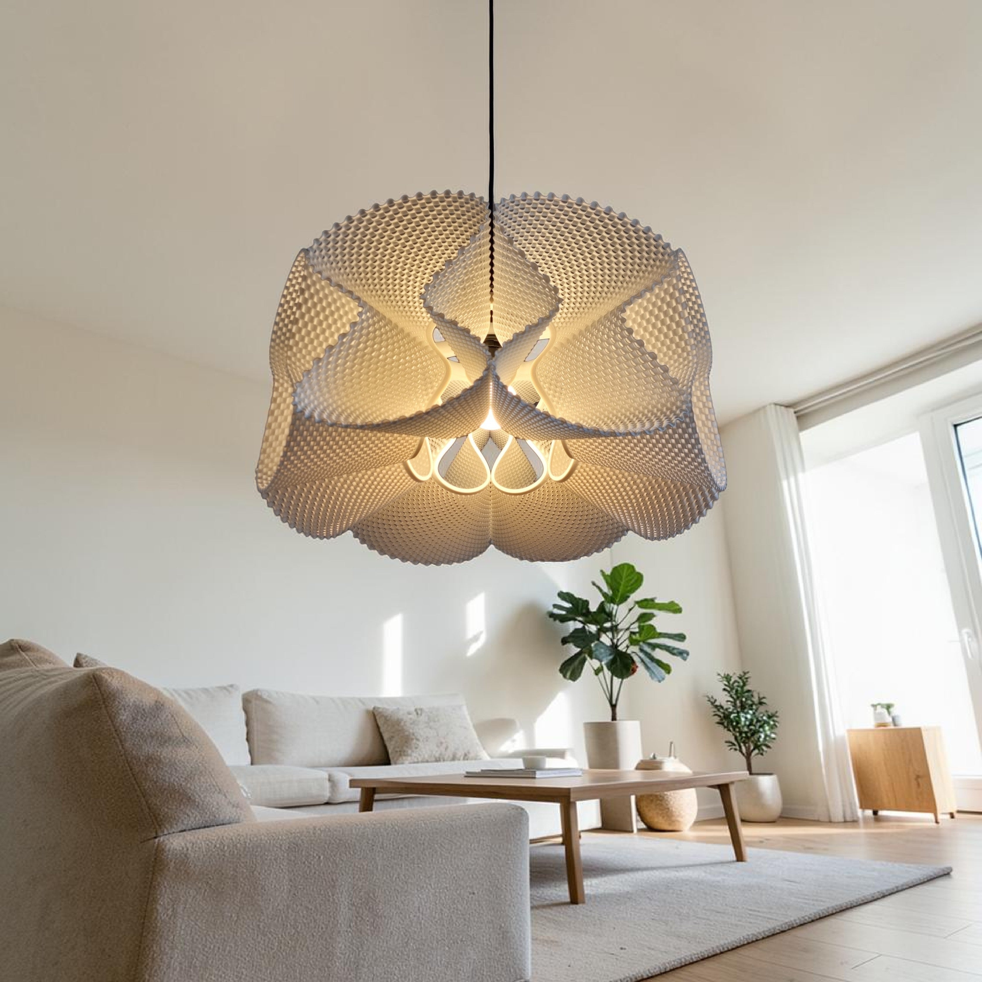 Suspension COROA 48 cm au-dessus d'un salon design, luminaire bioplastique blanc, lampe corolle minimaliste Quarks, déco intérieure