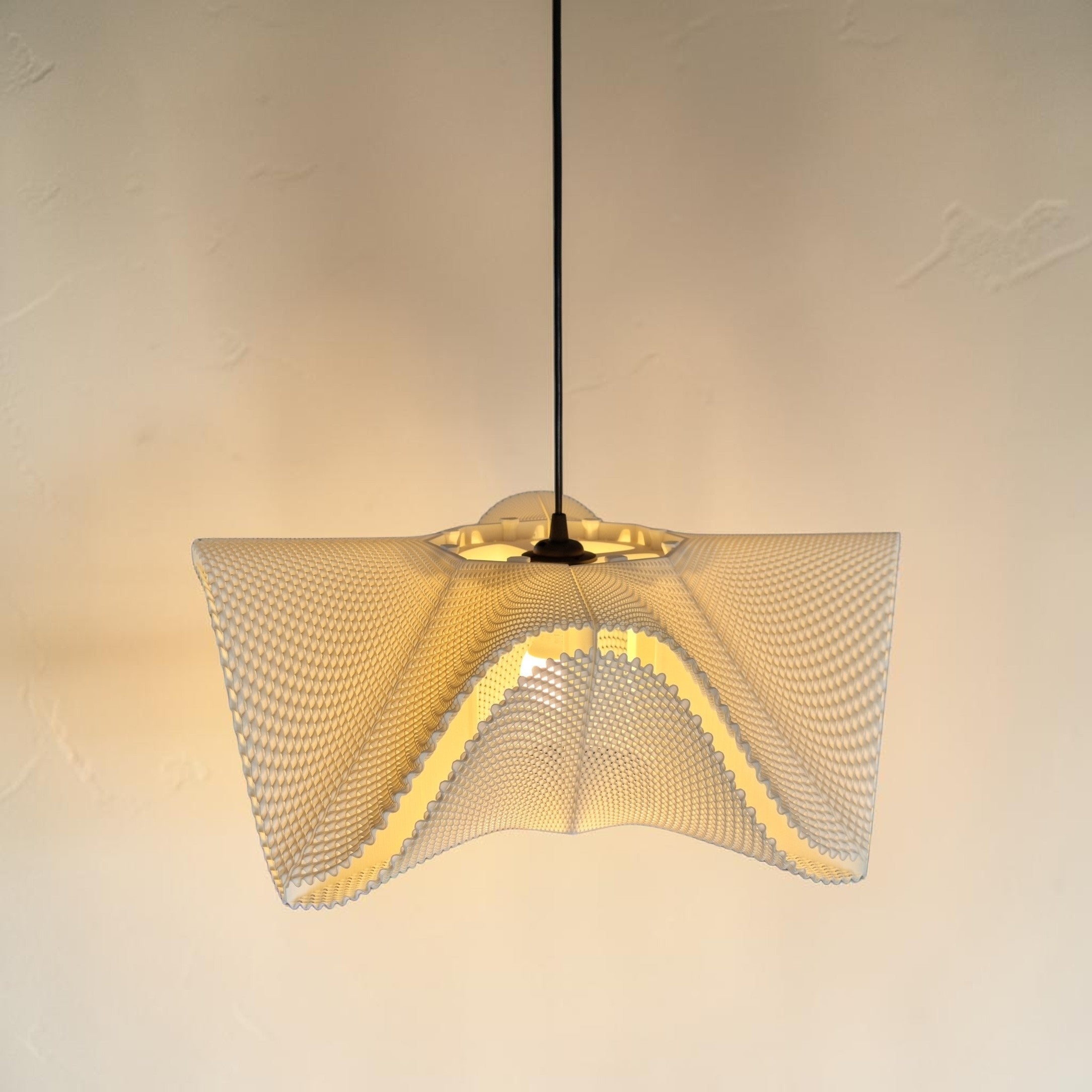 Large SINE pendant lamp glowing softly through an openwork structure, modern home decor lighting, 48 cm.