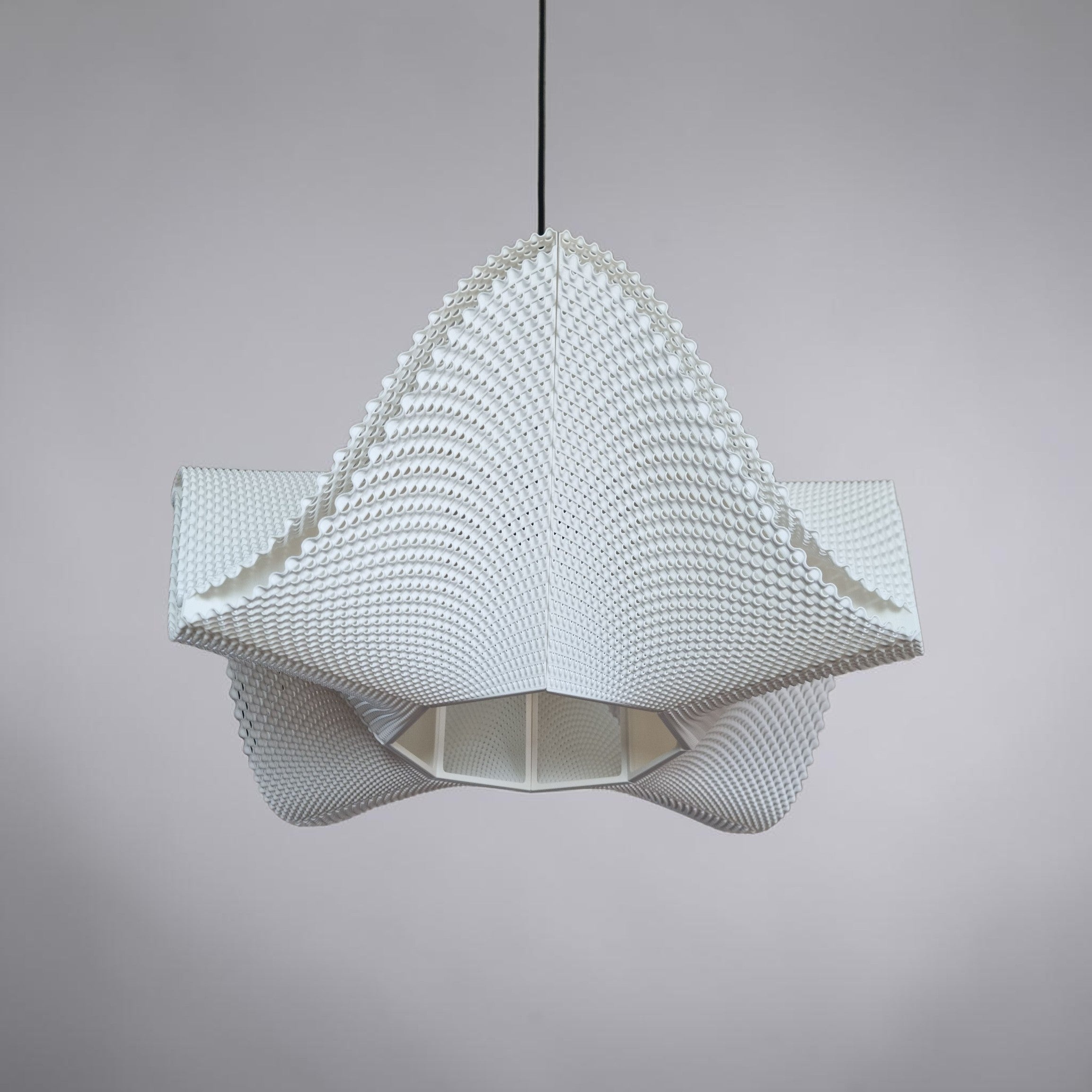 Close-up of the SINE pendant, white 3D printed lampshade with fine wave-like ribbing, contemporary Quarks lighting.