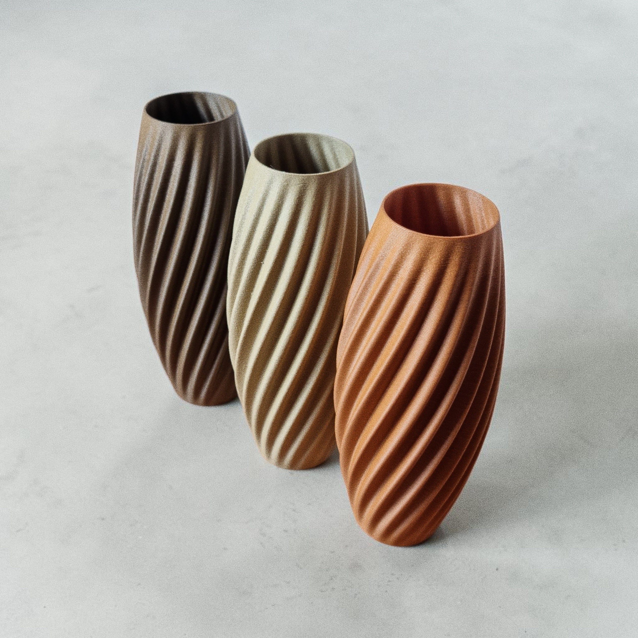 Three TEXTURIA spiral wood vases in Smoked Walnut, Birch and Amber Oak, 3D printed dried flower decor